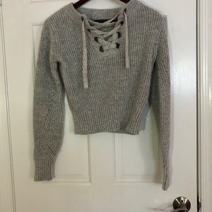 Sweater with crisscross front